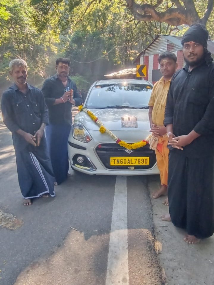Ayyappa devotees on Sabarimala yatra with Sri Kamatchi Amman Travels Swift Dzire TN60 AL7890